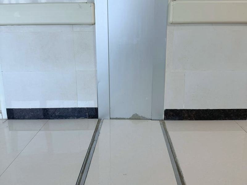 A MegAtec 360 wall joint cover meeting a SeismAtec 450 floor joint in a corridor of the Mother & Child Hospital, Guwahati Medical College