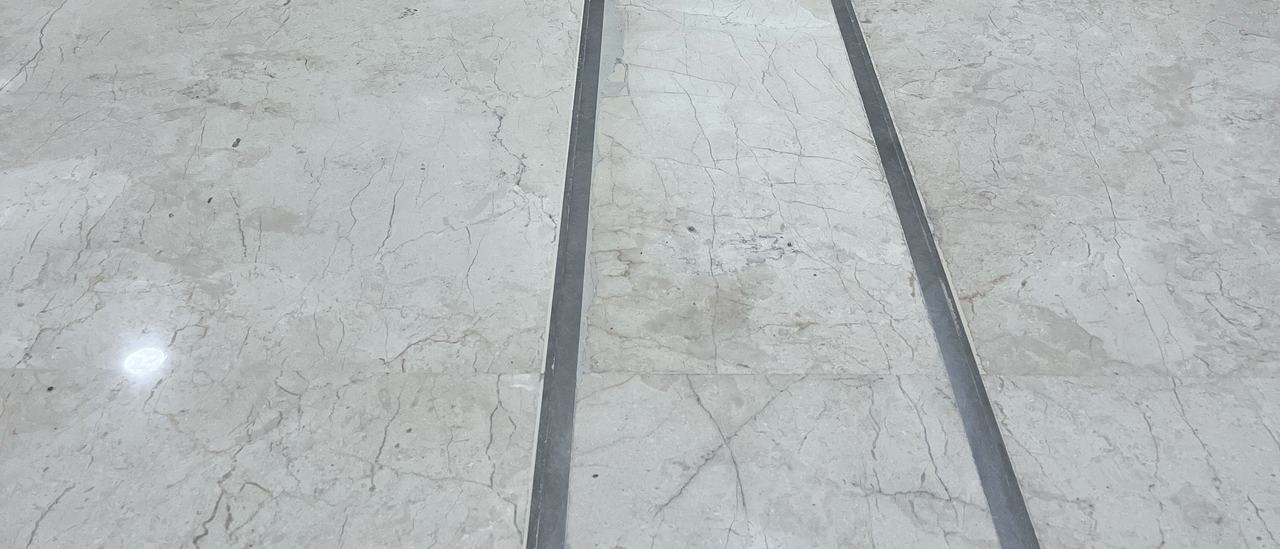 A SeismAtec 450 floor expansion joint set in a polished marble floor at Embassy 3A, Bengaluru